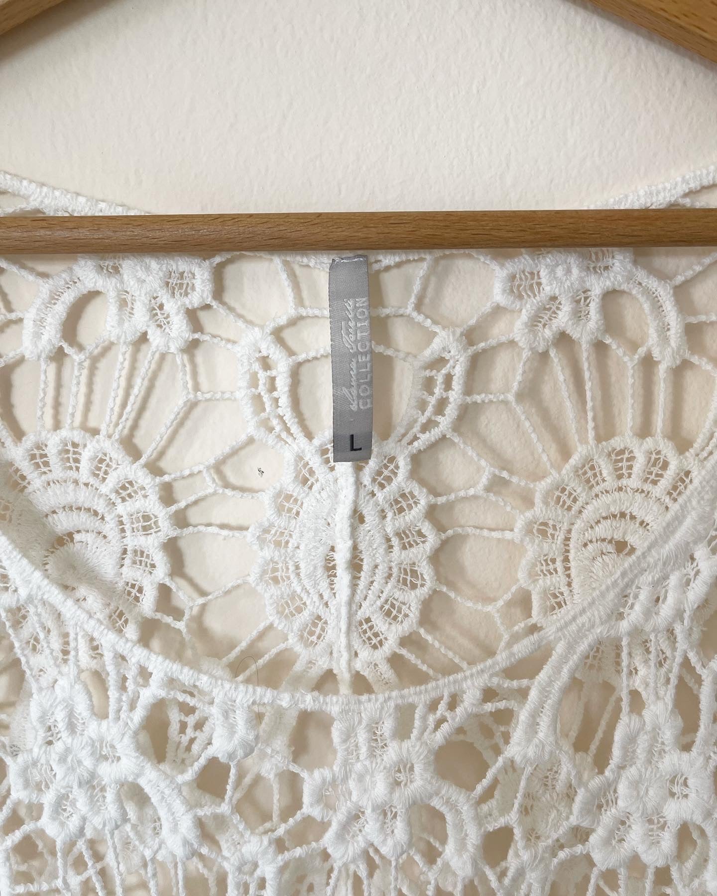 Lovely crochet cotton top in a white color