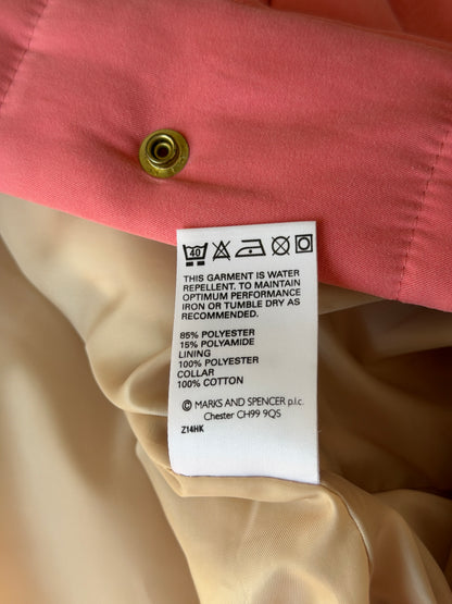 Charming quilted jacket in a soft coral pink shade