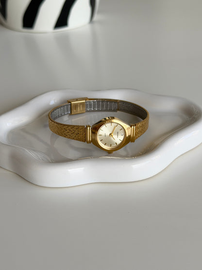 Dainty vintage Sekonda gold-tone watch