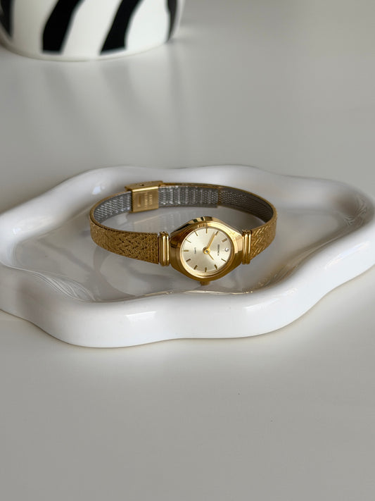 Dainty vintage Sekonda gold-tone watch