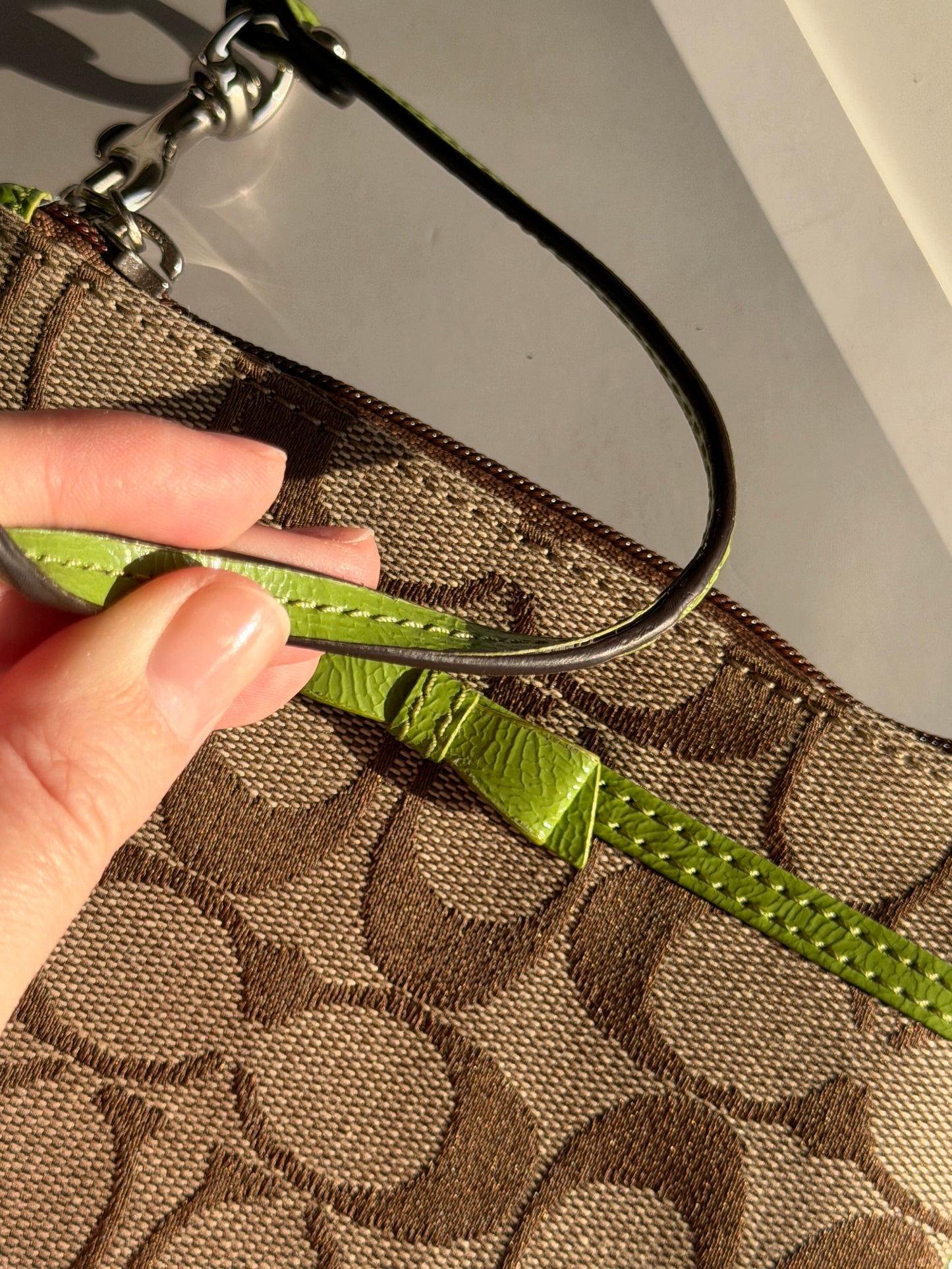 Vintage Coach wristlet with lime green bow