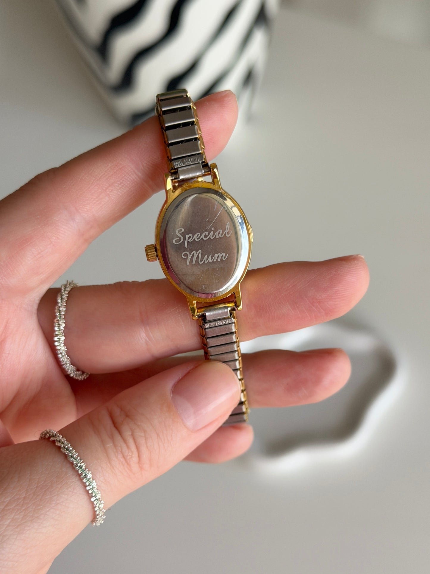 Lovely two-tone Limit watch with engraving on the case back
