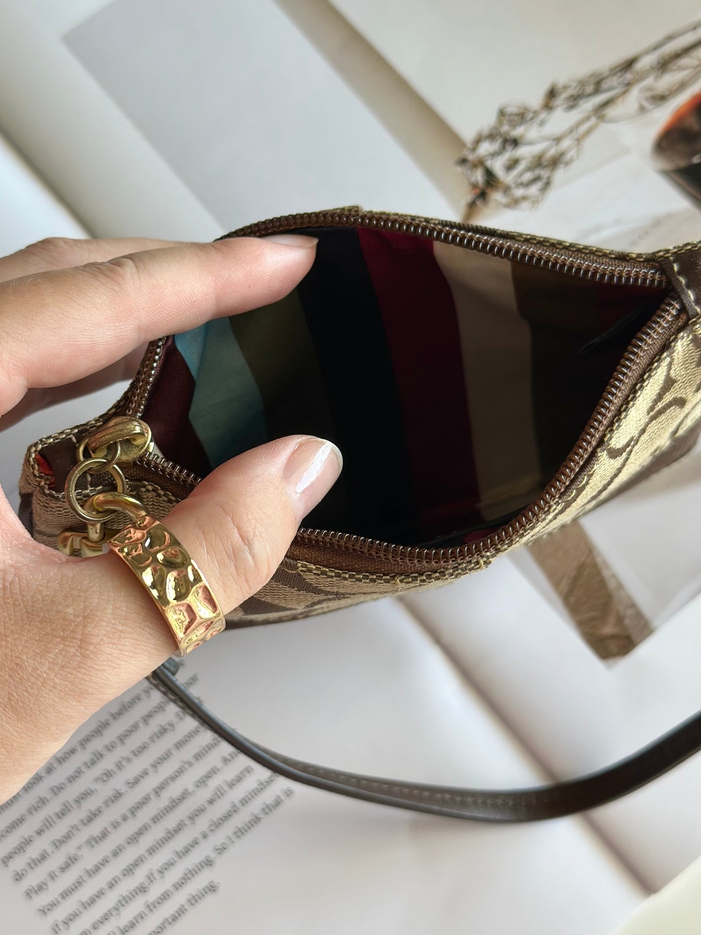 Iconic vintage brown Coach wristlet