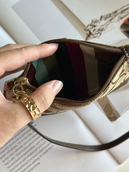 Iconic vintage brown Coach wristlet