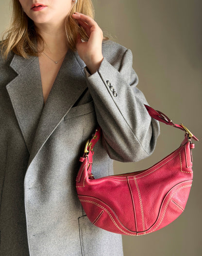 Iconic vintage Coach Soho bag in vibrant fuchsia leather