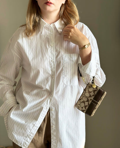 Iconic vintage brown Coach wristlet