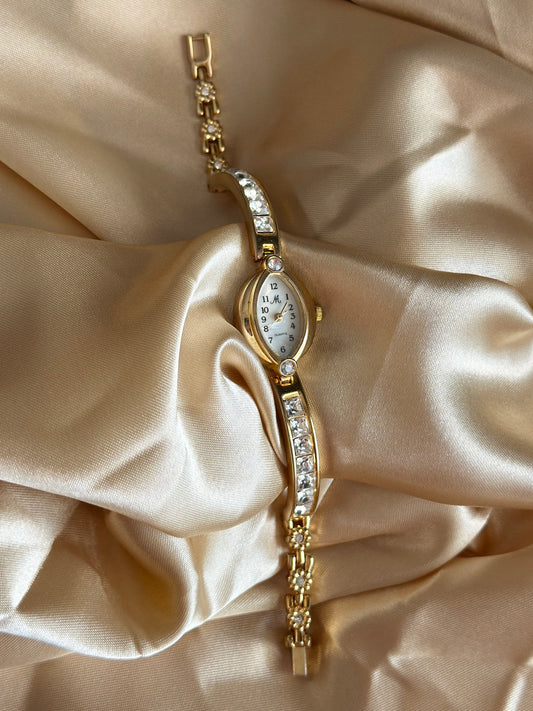 Charming vintage gold-tone watch with crystals