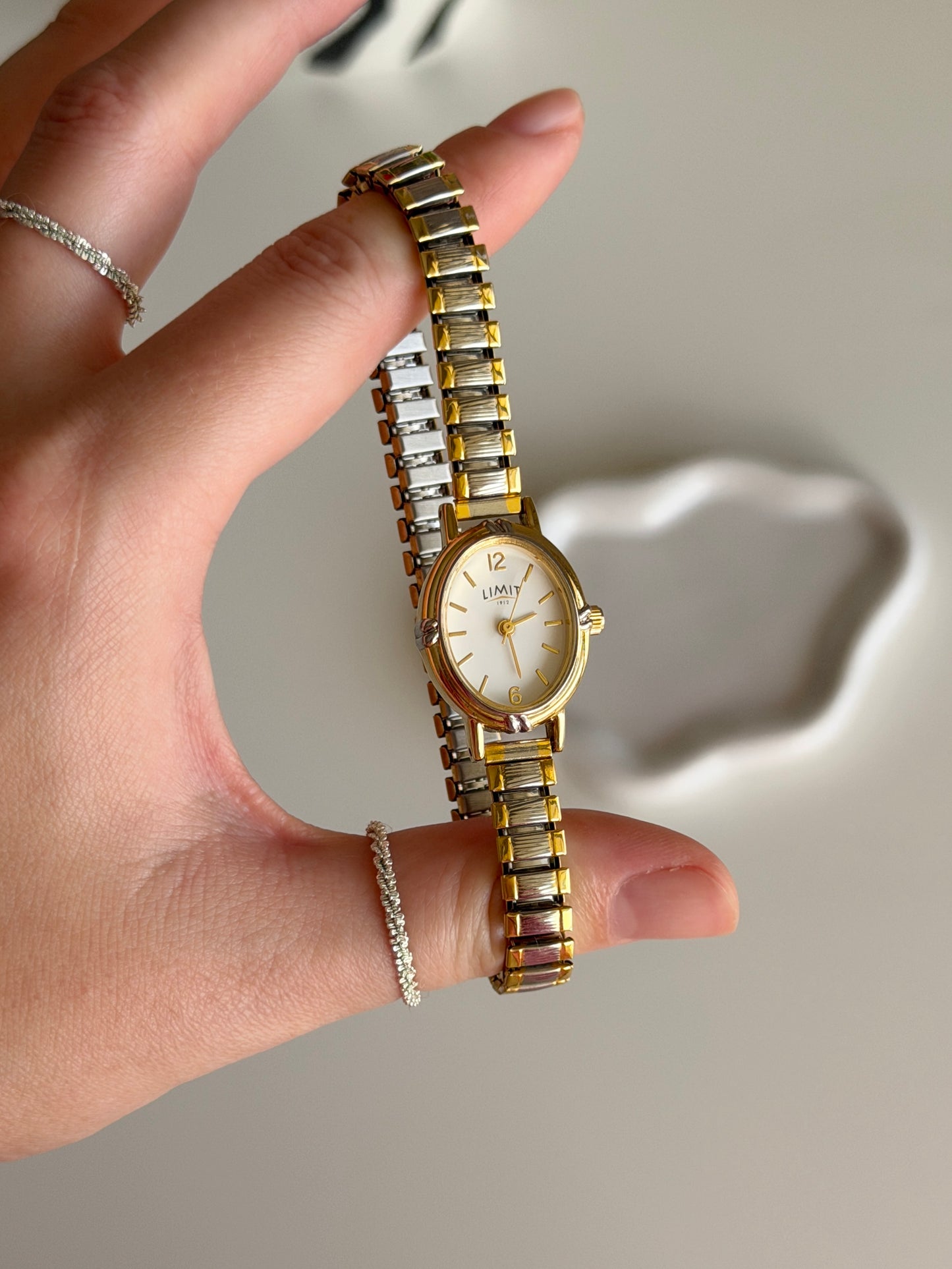 Lovely two-tone Limit watch with engraving on the case back