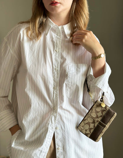Iconic vintage brown Coach wristlet