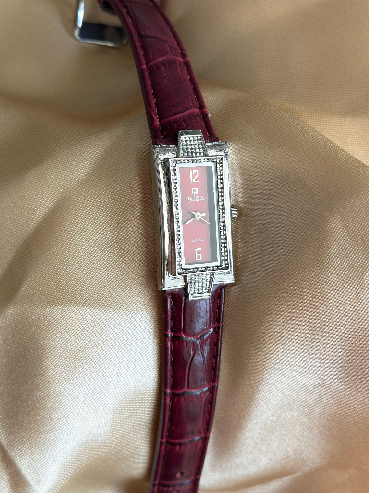 Classic watch with burgundy leather strap