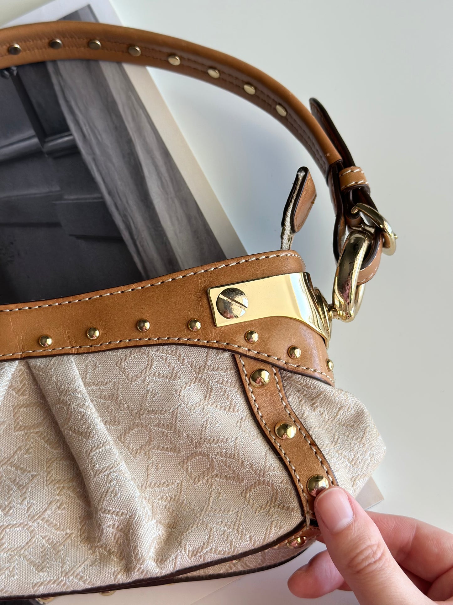 Vintage chic DKNY small bag with edgy details