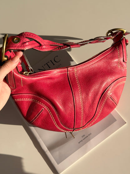 Iconic vintage Coach Soho bag in vibrant fuchsia leather