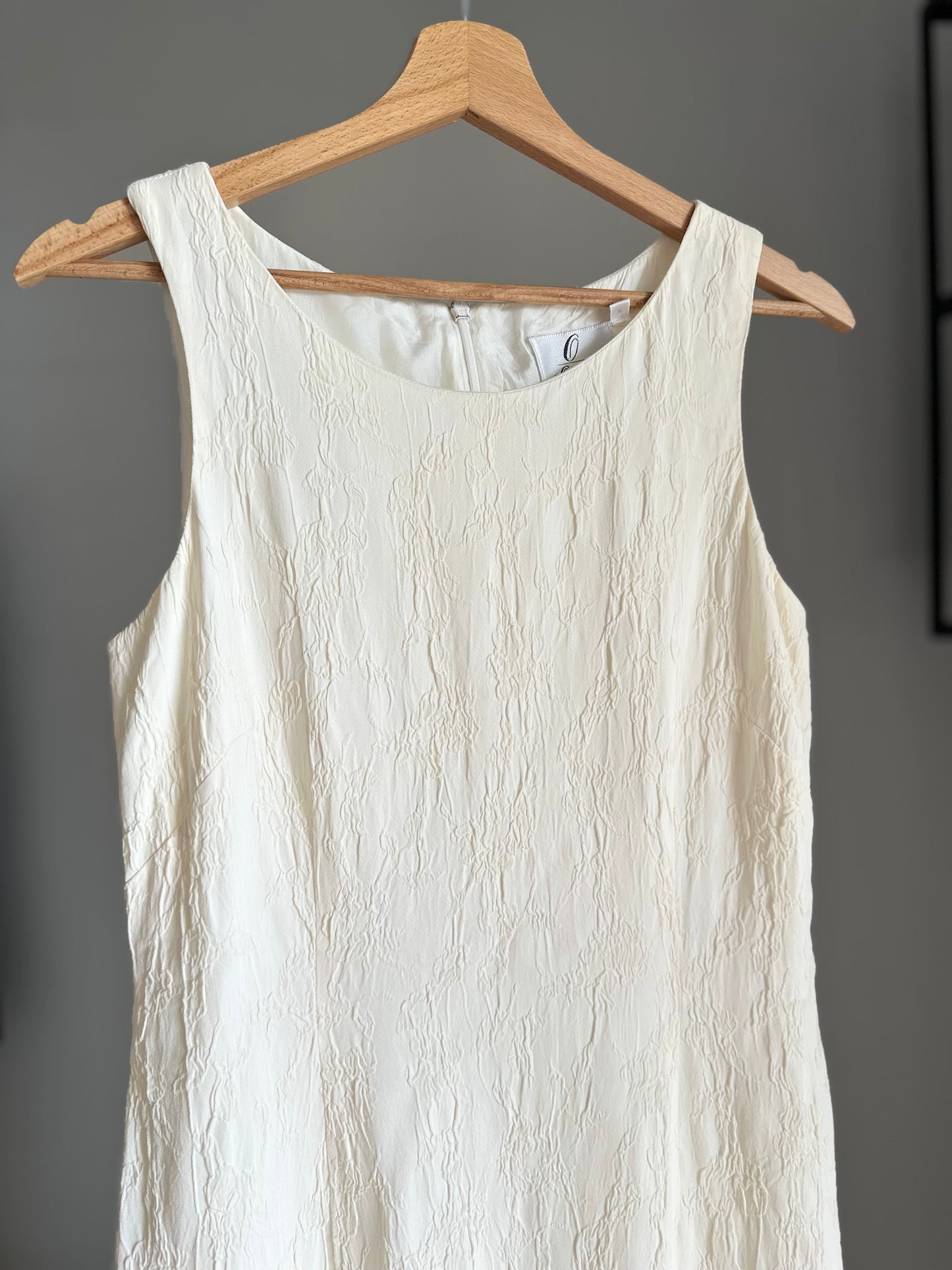 Elegant vintage midi dress in a soft cream tone