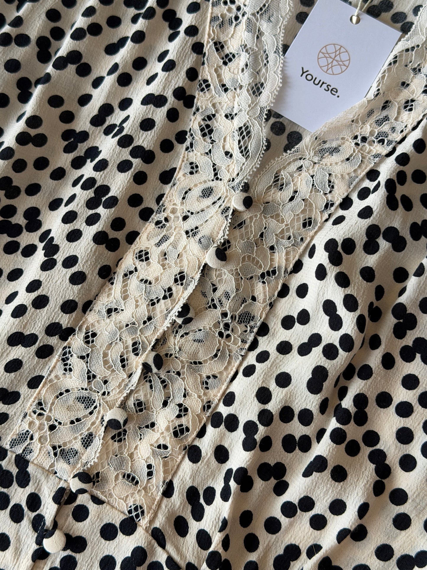 Polka dot blouse with lace