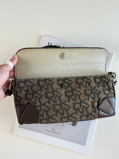 Chic vintage DKNY baguette bag with a rich brown monogram pattern