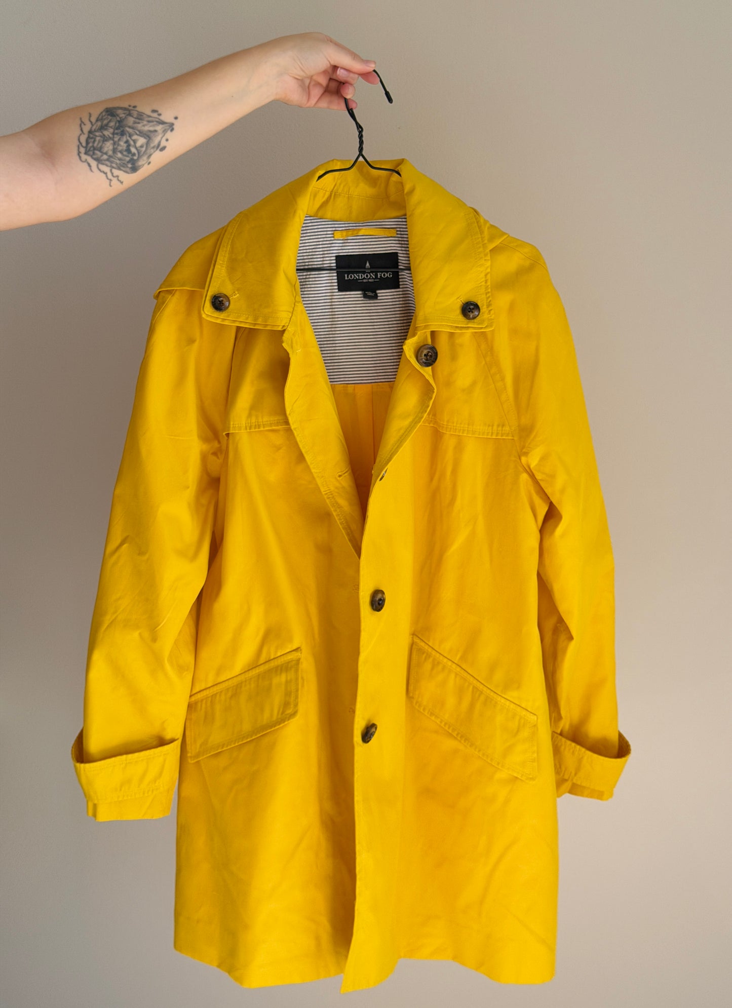 Vibrant yellow London Fog trench coat