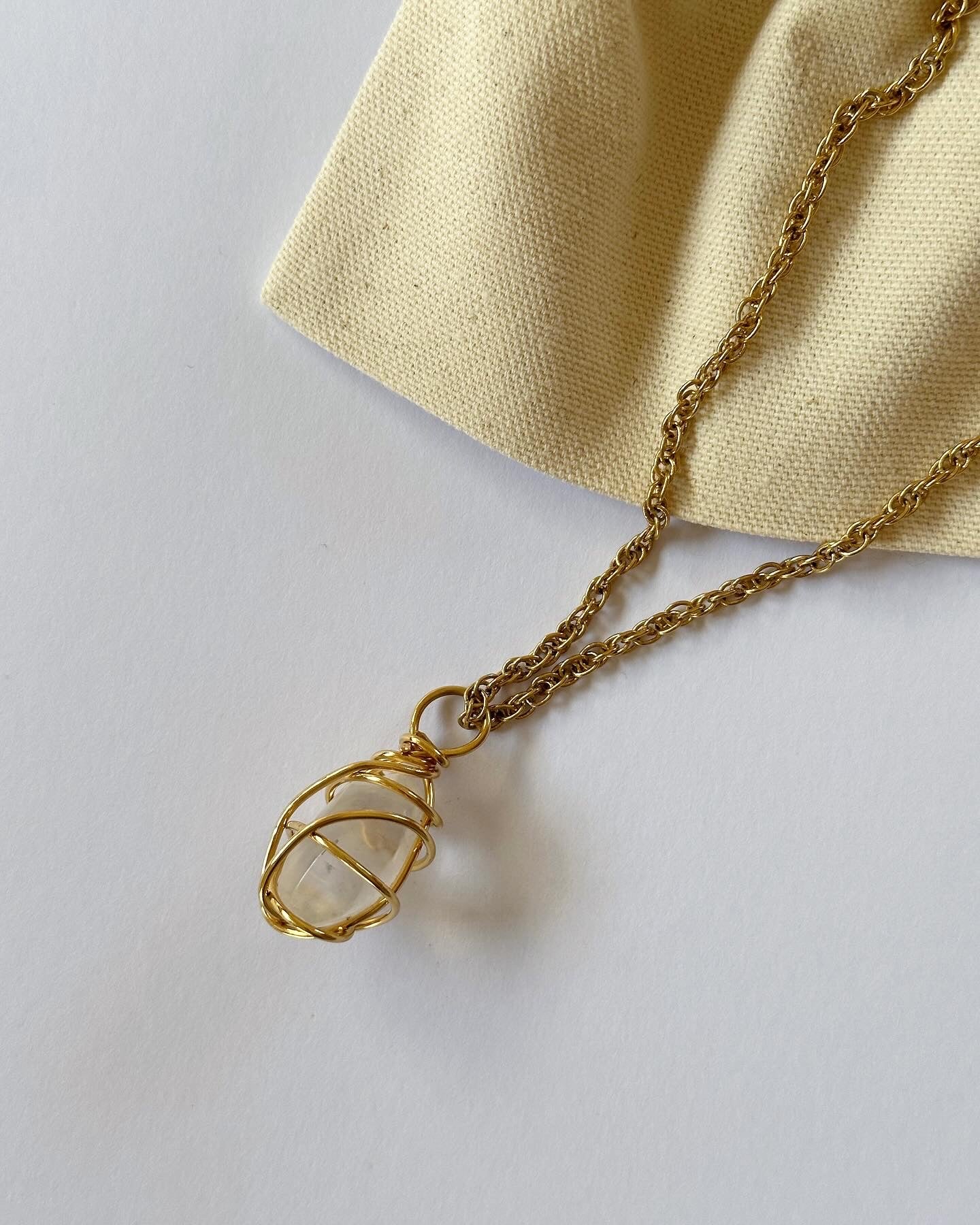 Vintage long gold-tone necklace with natural stone pendant by Avon