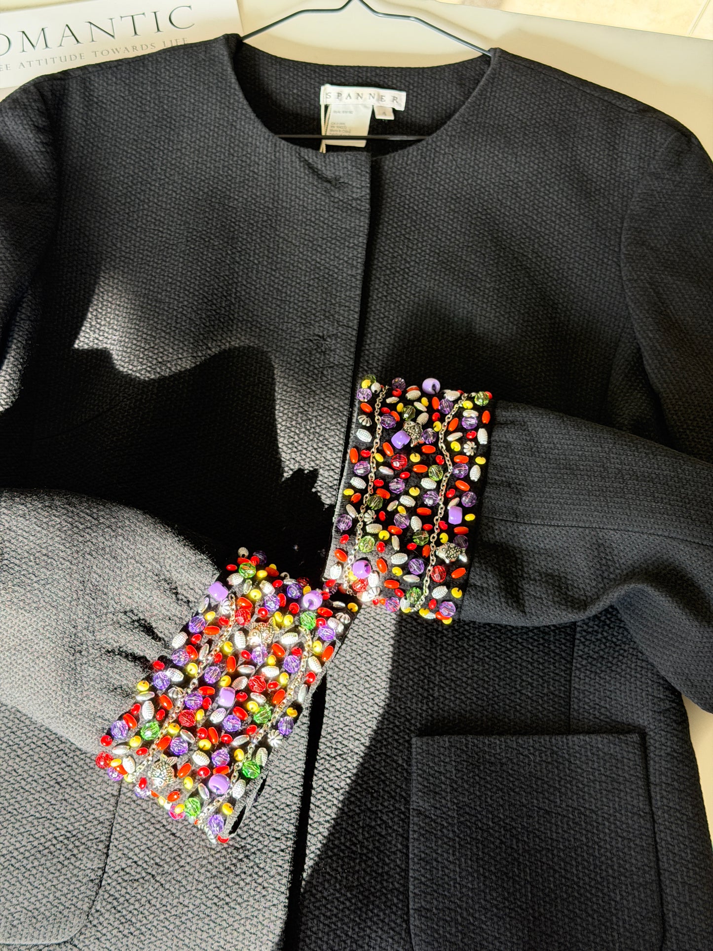 Chic vintage black blazer with embellished cuffs