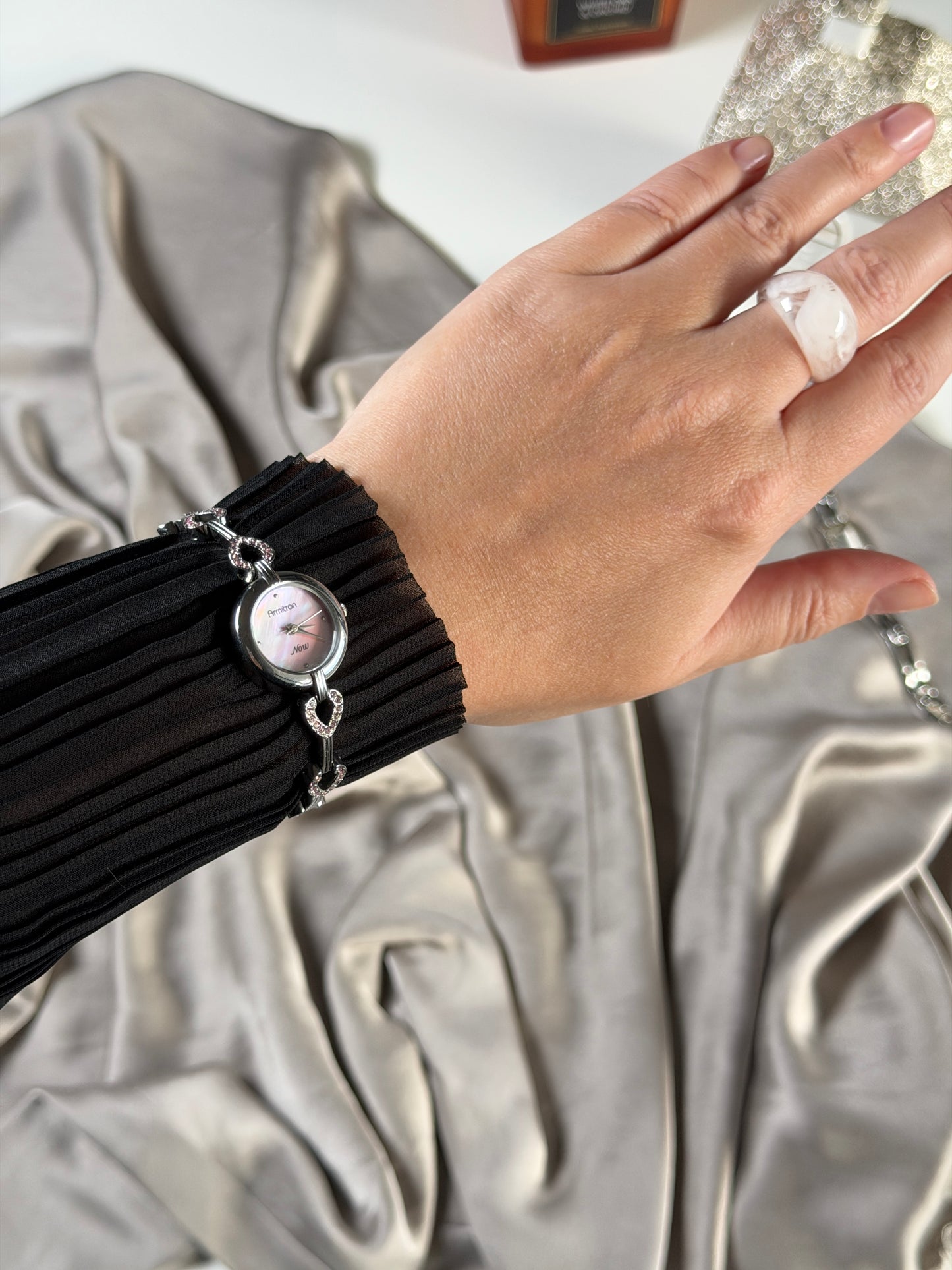 Charming vintage Armitron watch with heart links