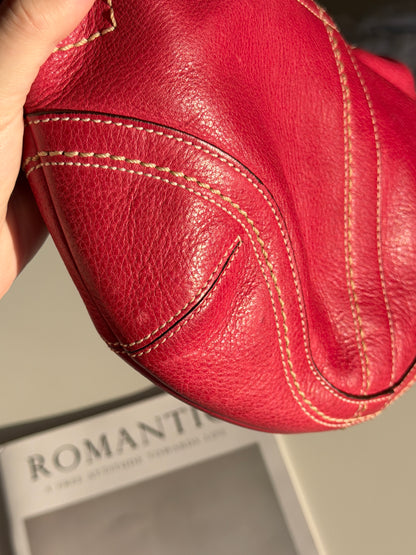 Iconic vintage Coach Soho bag in vibrant fuchsia leather