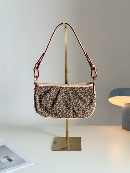 Charming vintage DKNY baguette bag in beige canvas