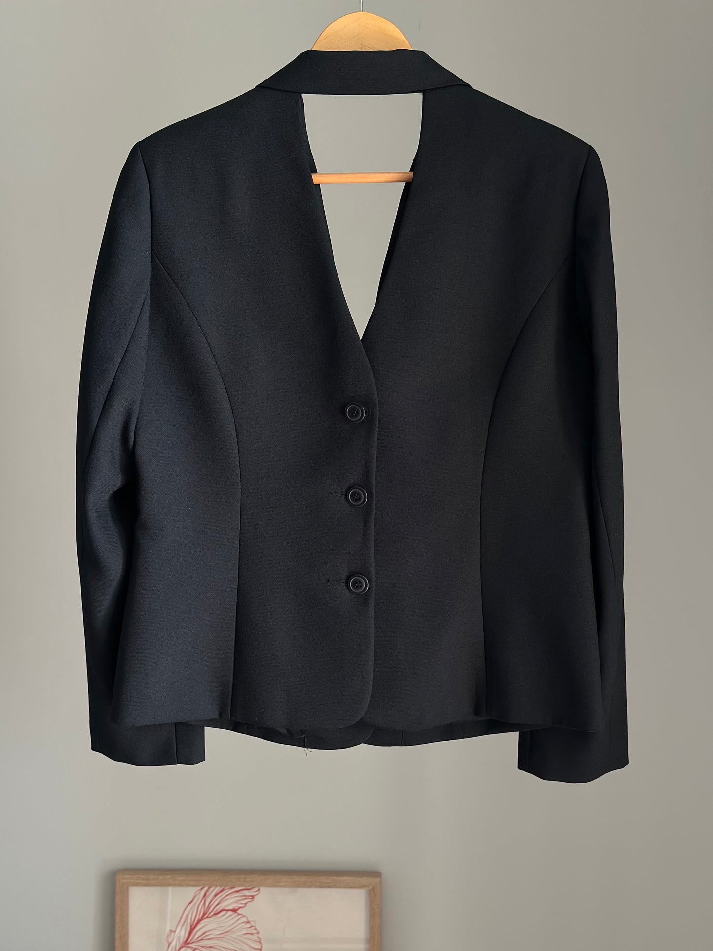 Striking vintage black blazer with open back