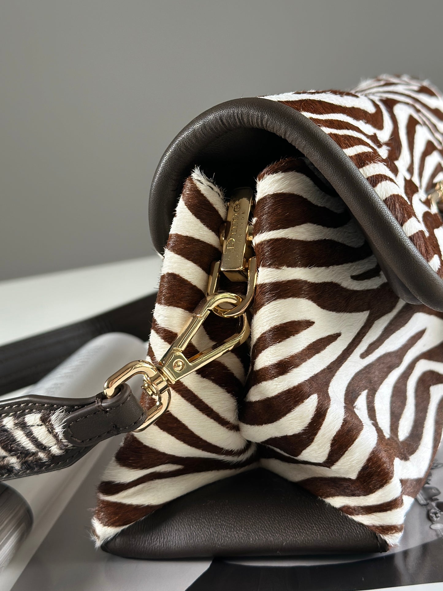 Striking Dune London shoulder zebra bag