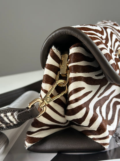 Striking Dune London shoulder zebra bag