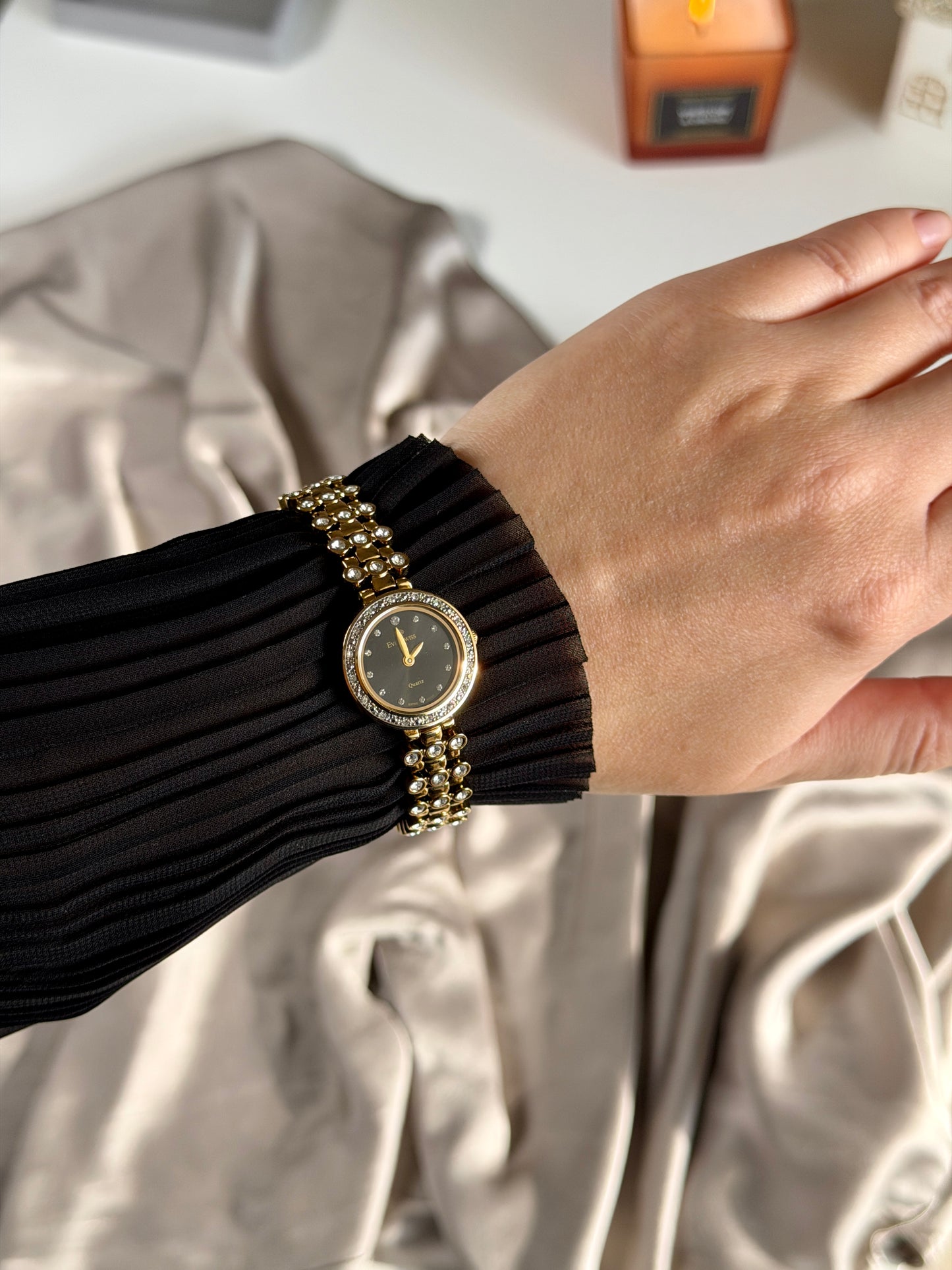 Elegant vintage gold-tone watch EverSwiss with black dial