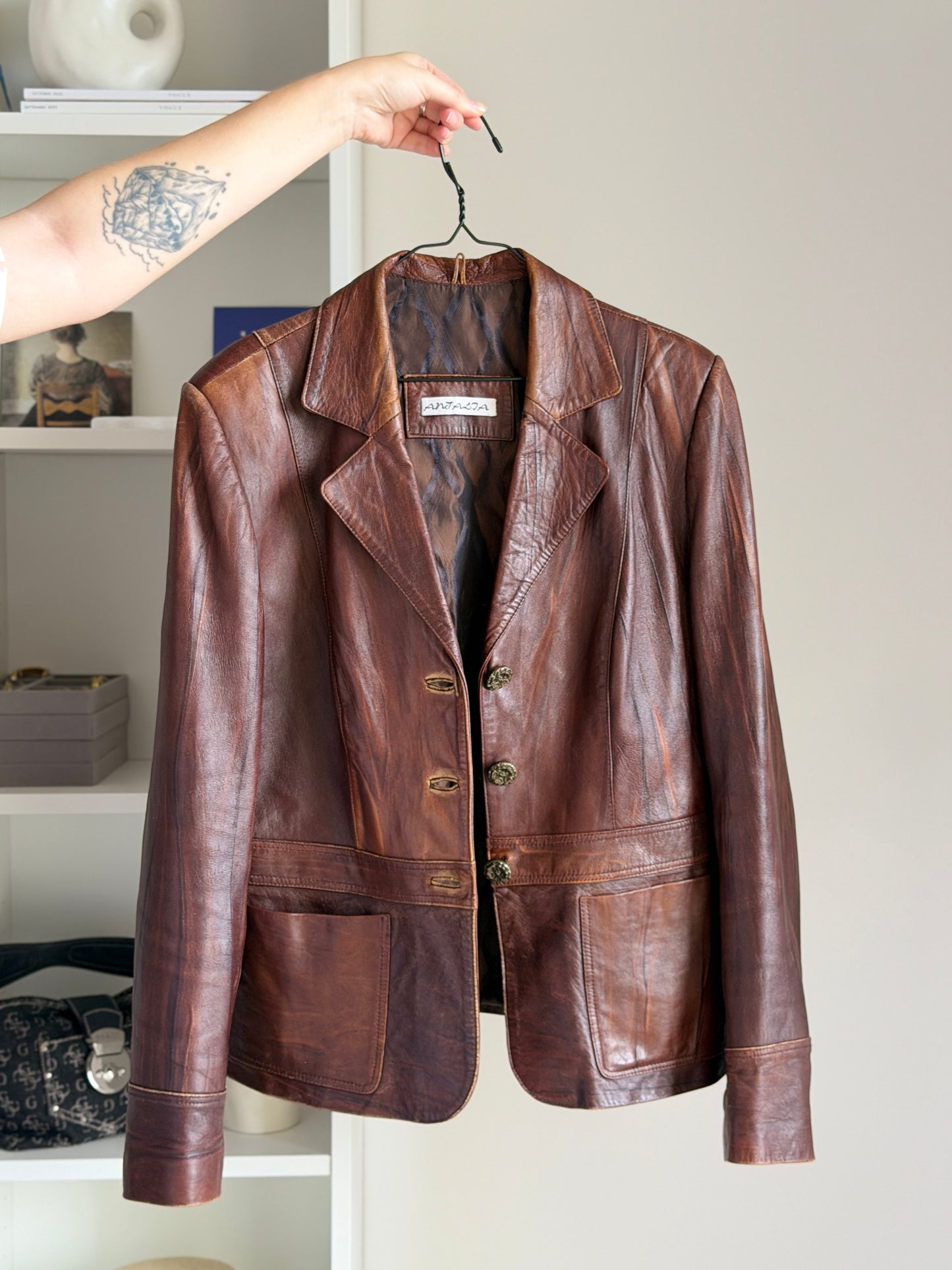Vintage distressed leather jacket in rich brown tone