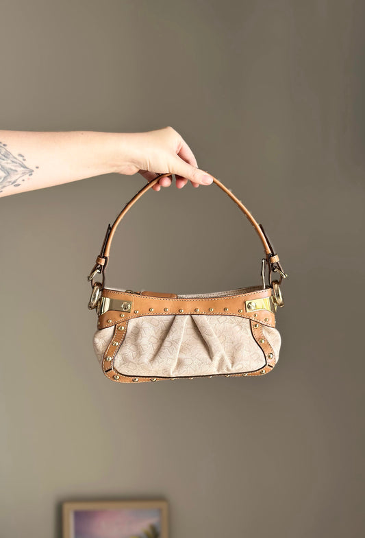 Vintage chic DKNY small bag with edgy details