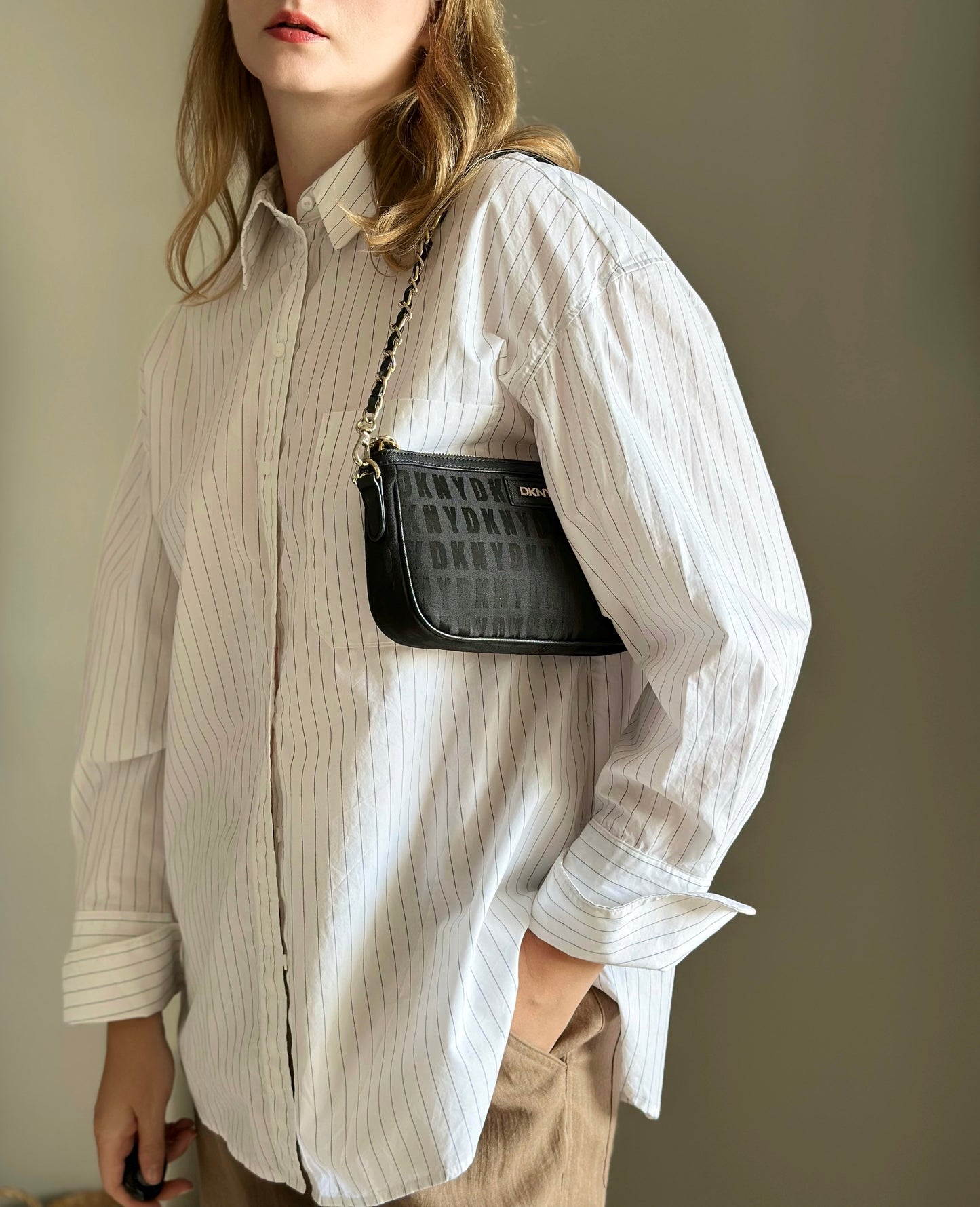 Stunning pre-loved black DKNY baguette bag