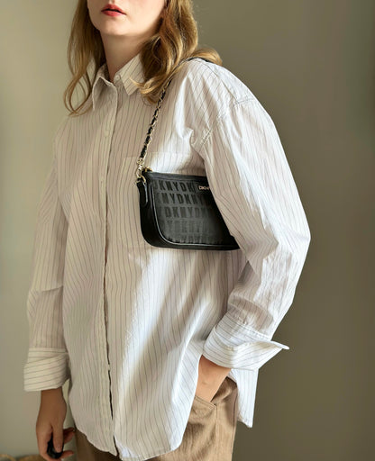 Stunning pre-loved black DKNY baguette bag