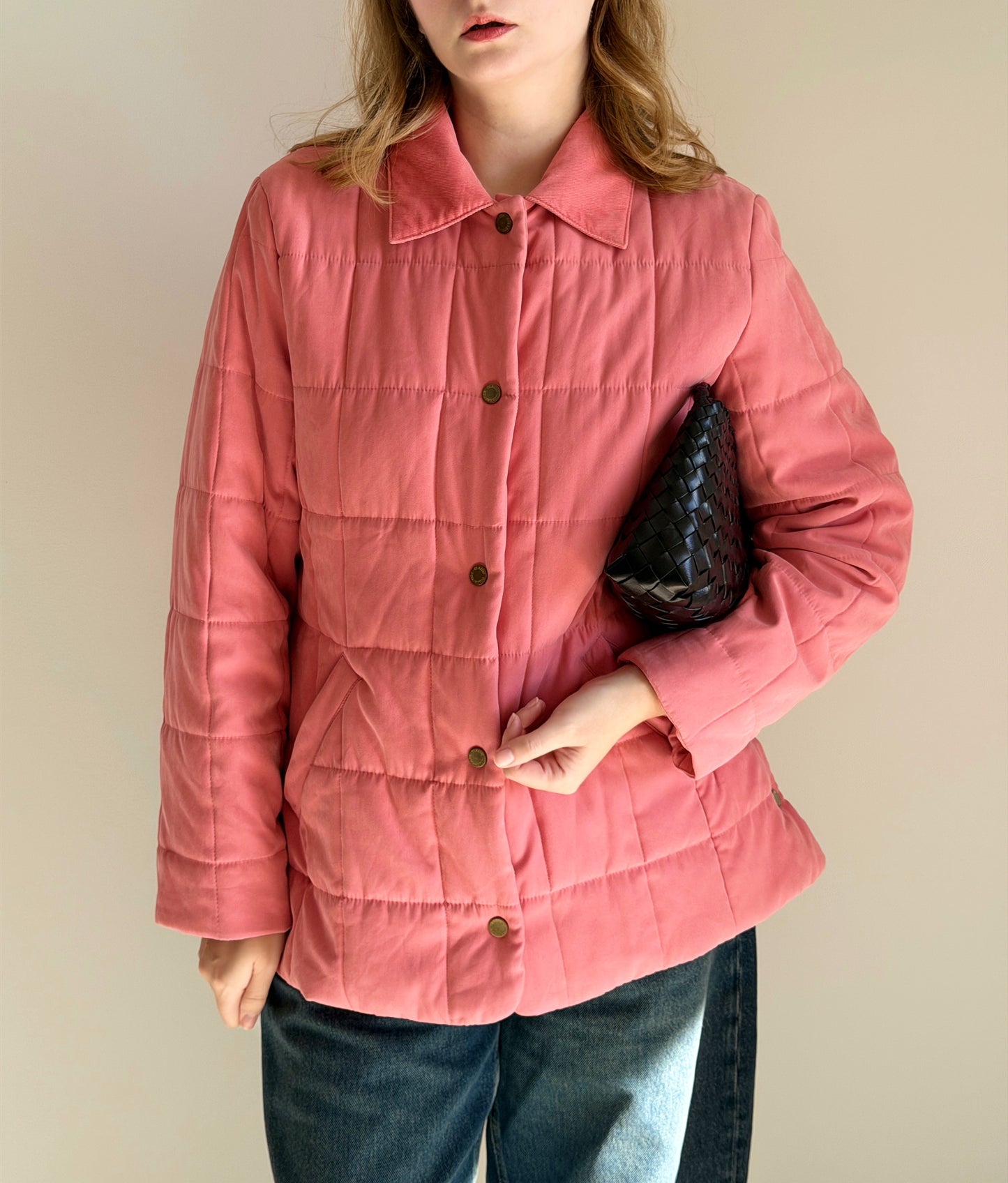 Charming quilted jacket in a soft coral pink shade