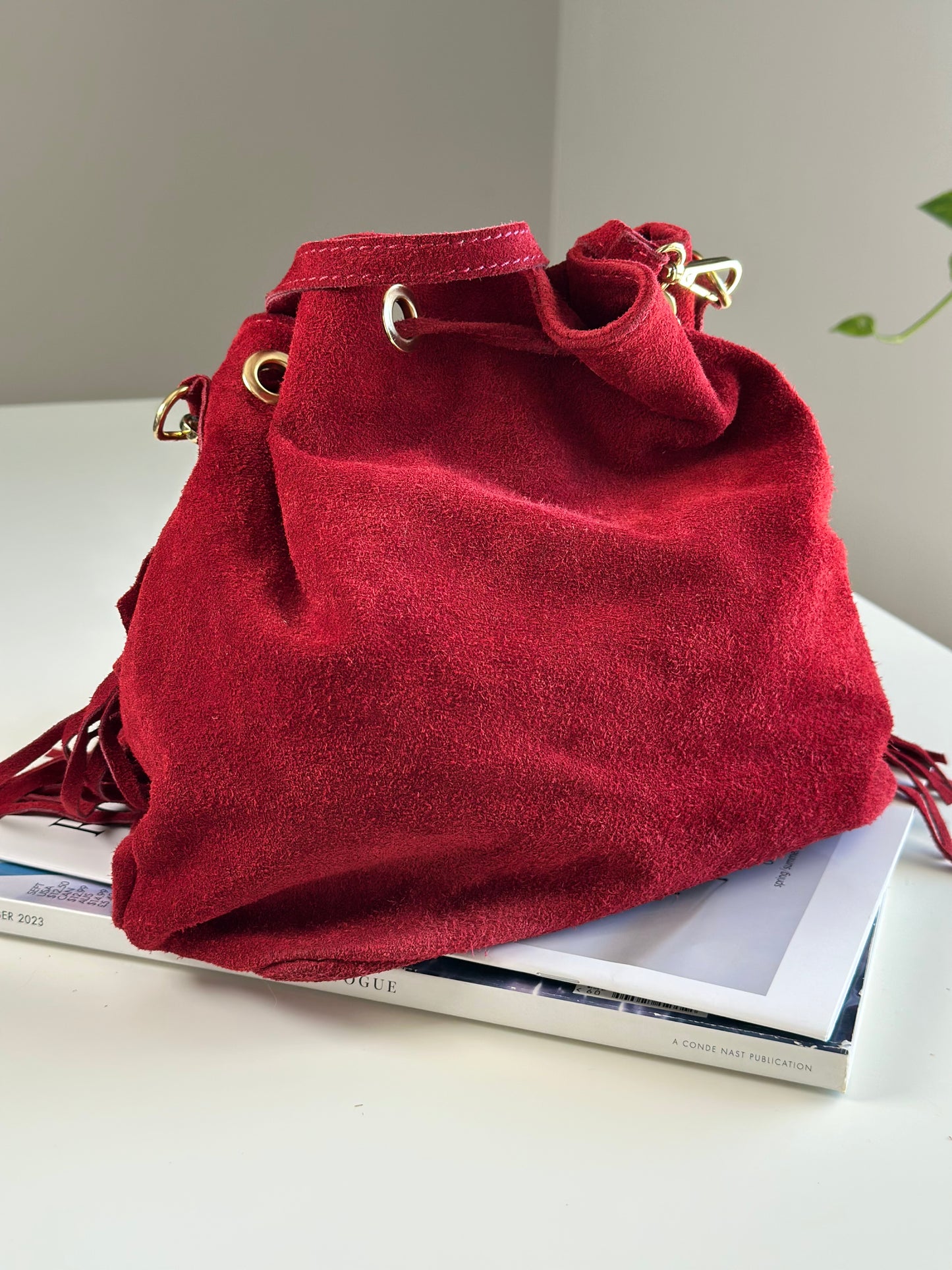 Dark red vintage suede bucket bag