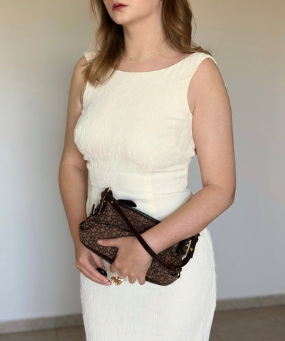 Elegant vintage midi dress in a soft cream tone