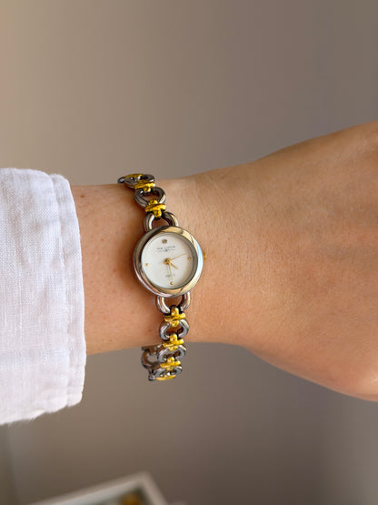 Vintage two-tone watch with a delicate round dial