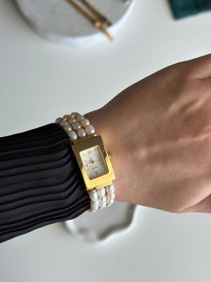 Elegant vintage watch with freshwater pearl bracelet