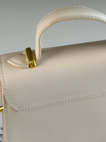Elegant ivory leather handbag from Kassandre
