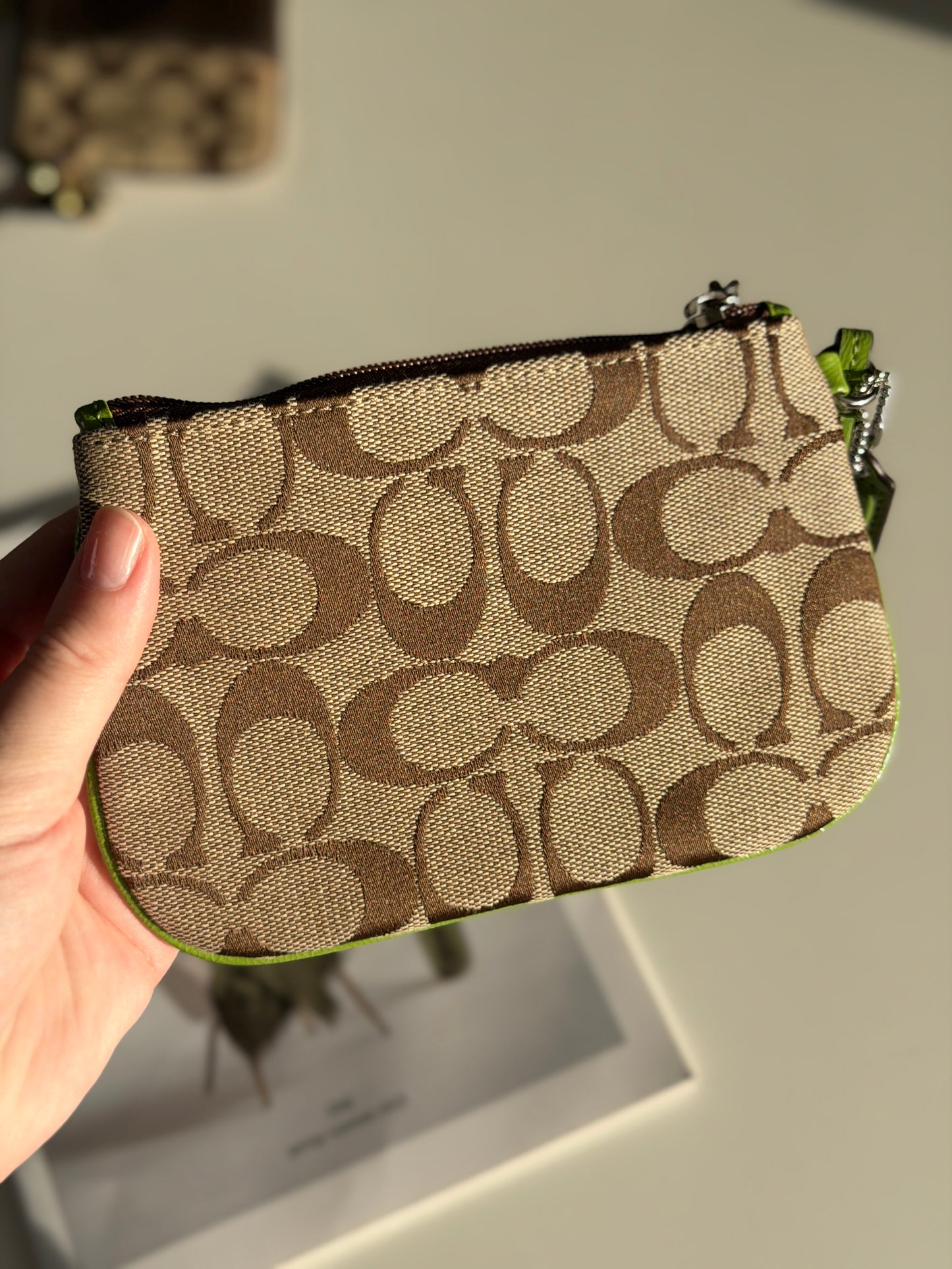 Vintage Coach wristlet with lime green bow