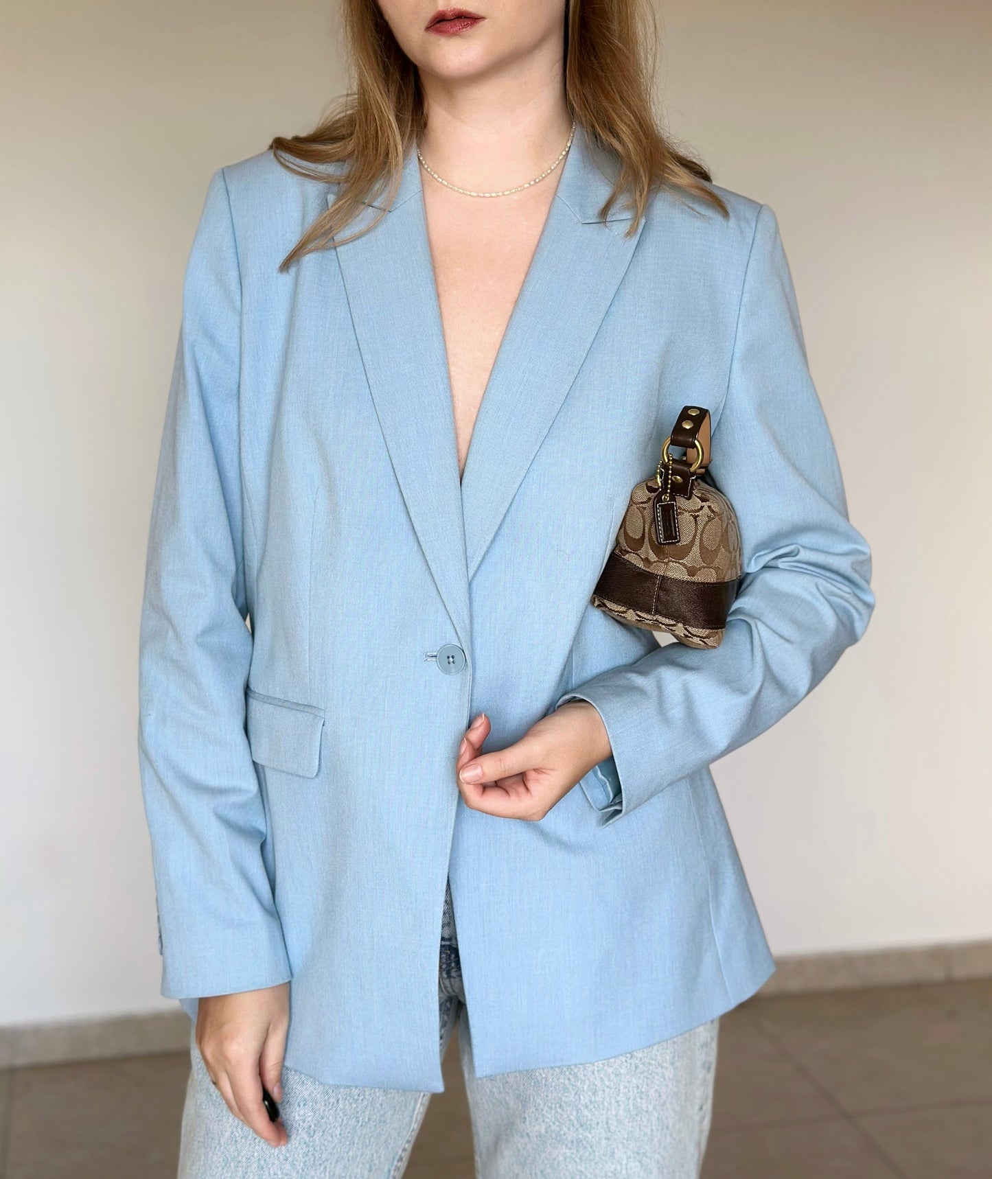 Pre-loved tailored blazer in a soft powder blue shade