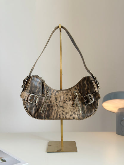 Stylish vintage DKNY shoulder bag in a snakeskin pattern