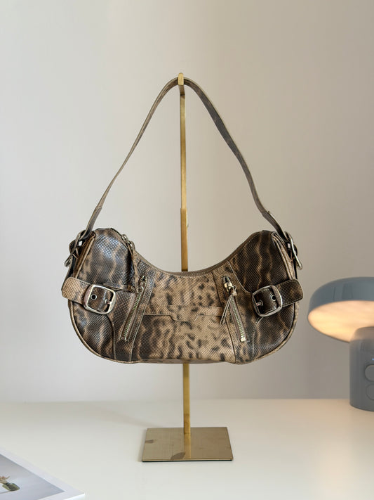 Stylish vintage DKNY shoulder bag in a snakeskin pattern