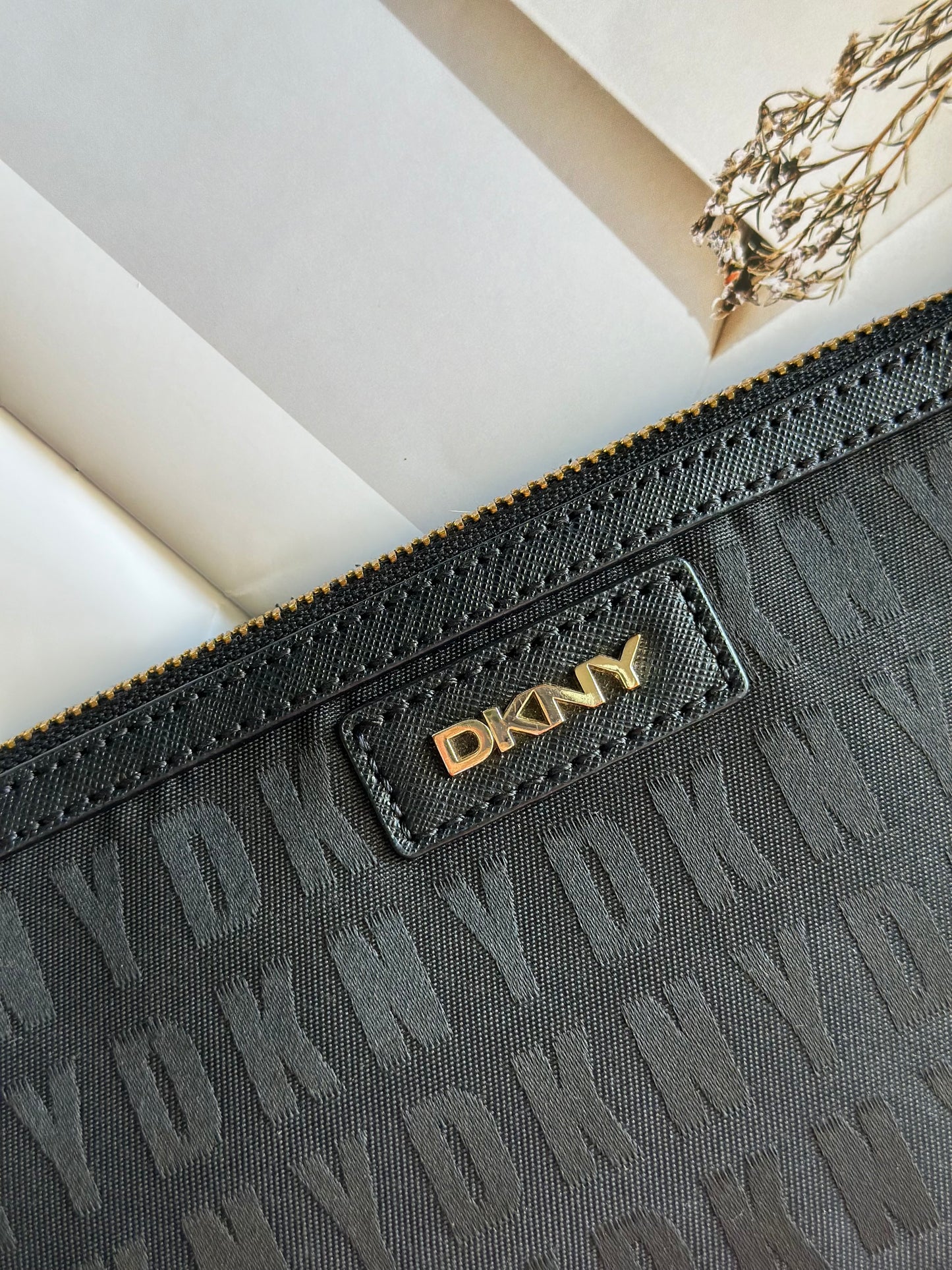 Stunning pre-loved black DKNY baguette bag
