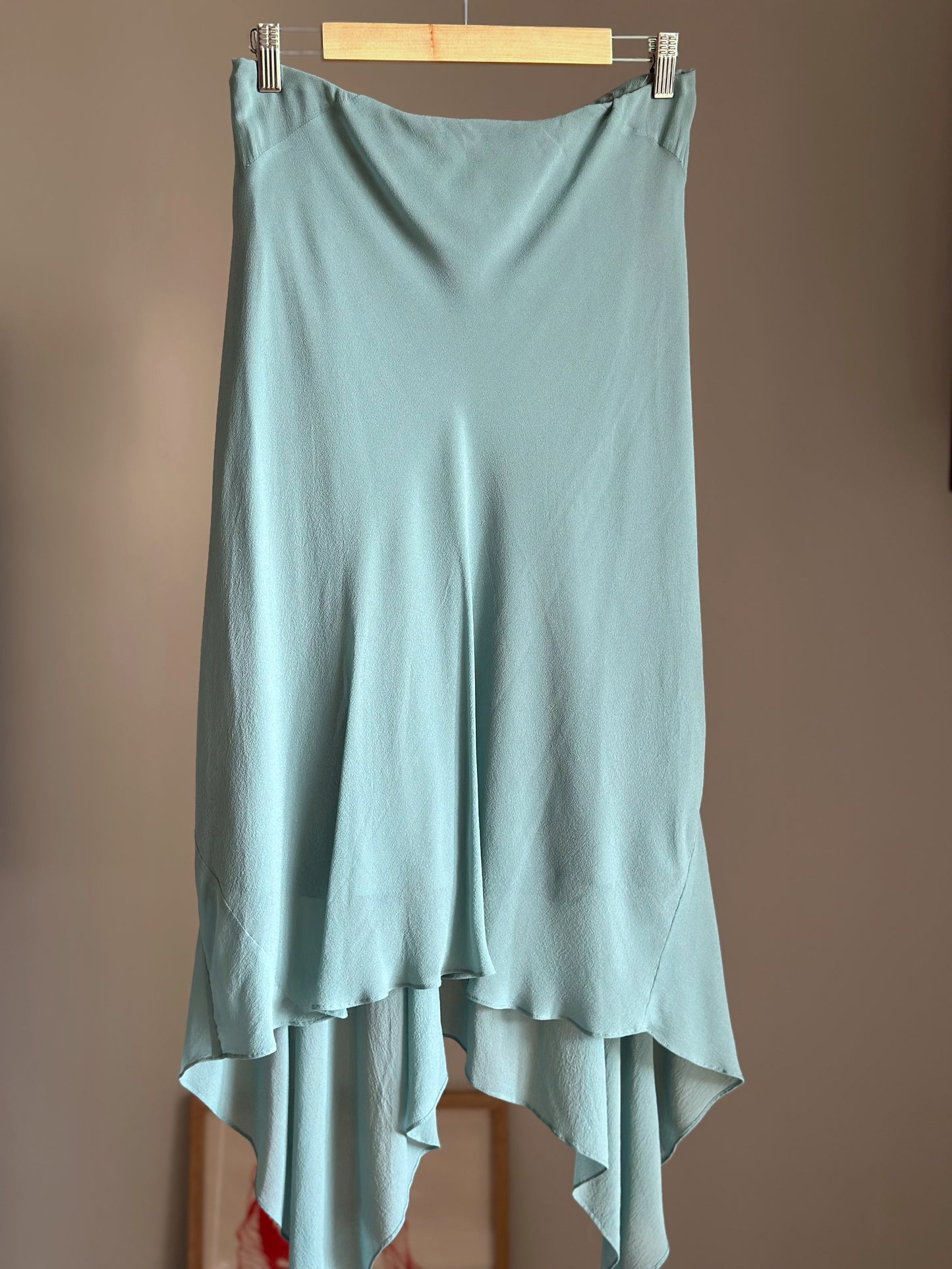 Asymmetrical silk turquoise skirt by Pearce Fionda brand