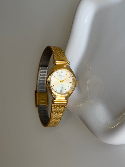 Dainty vintage Sekonda gold-tone watch