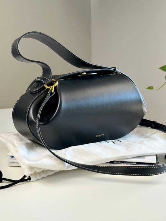 Stunning Yuzefi Loaf Bag crafted from black leather