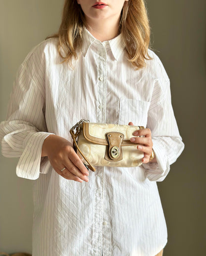 Amazing beige Y2K wristlet from Coach