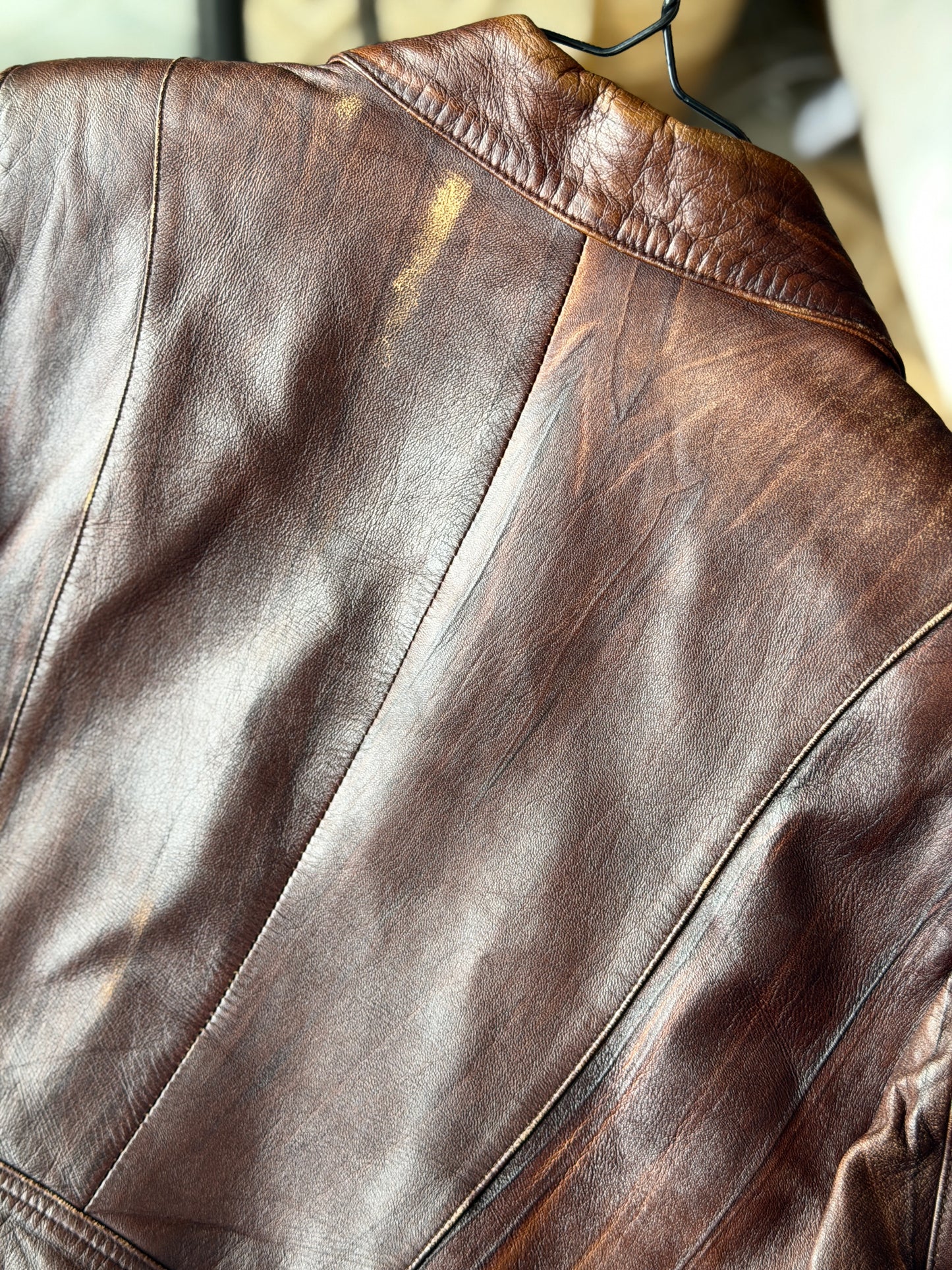 Vintage distressed leather jacket in rich brown tone
