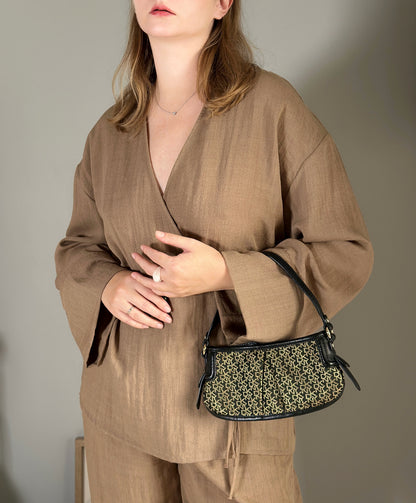 Chic vintage DKNY bag in black and gold